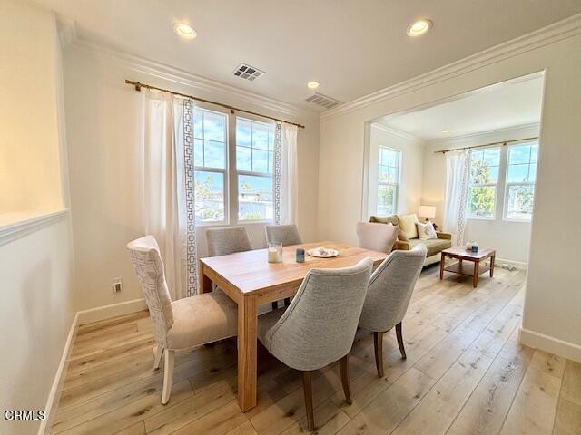 3640 Islander Walk Oxnard, CA 93035 - Photo 9 of 31 a view of a a dining room with furniture window and wooden floor