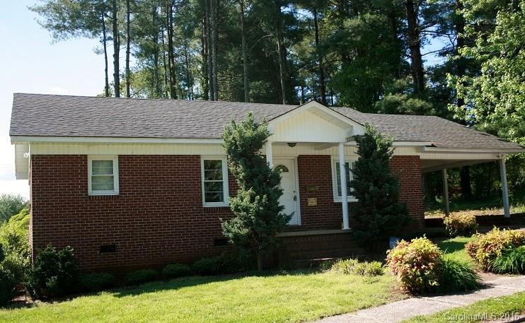 117 Pine Street Rutherfordton, NC 28139 - Photo 13 of 14 a front view of a house with garden