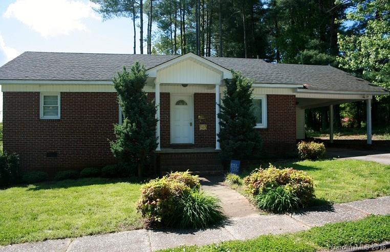 117 Pine Street Rutherfordton, NC 28139 - Photo 14 of 14 a front view of a house with garden