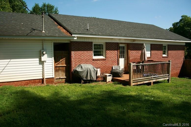 117 Pine Street Rutherfordton, NC 28139 - Photo 10 of 14 a view of a house with a yard and sitting area