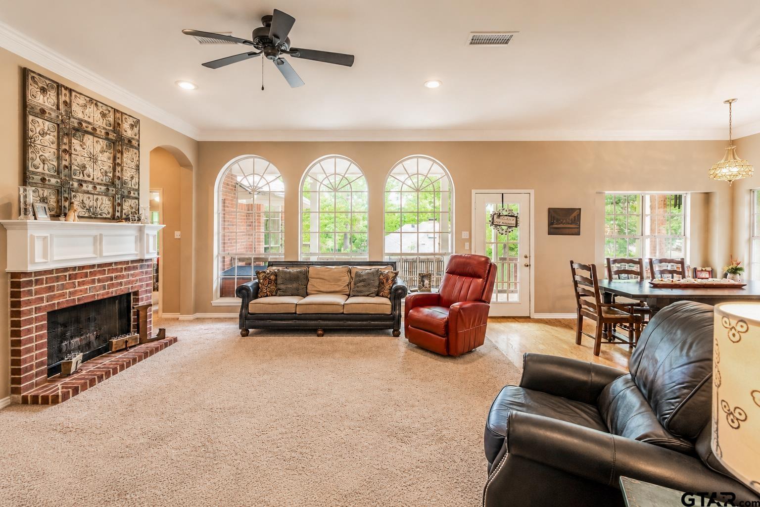1388 Santa Fe Trail Tyler, TX 75703 - Photo 22 of 46 a living room with furniture and a fireplace
