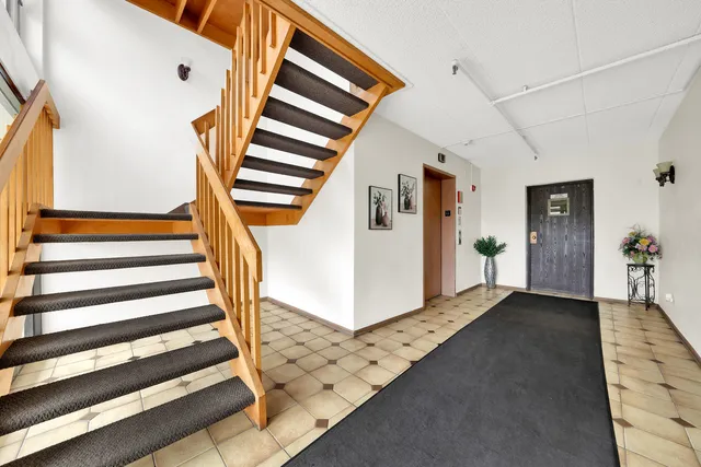 a view of an entryway with staircase