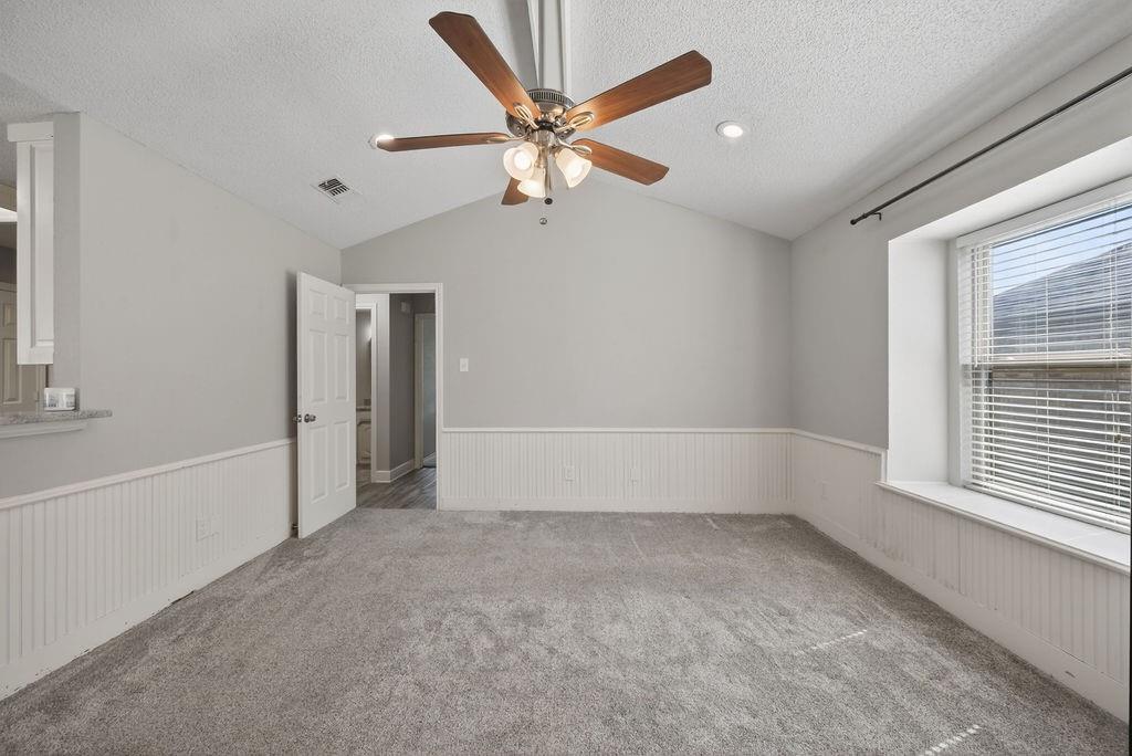 2229 Country Valley Road Garland, TX 75041 - Photo 11 of 34 a view of an empty room with a window