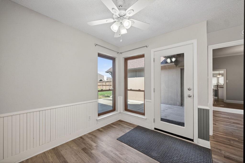 2229 Country Valley Road Garland, TX 75041 - Photo 15 of 34 a view of an empty room with glass door