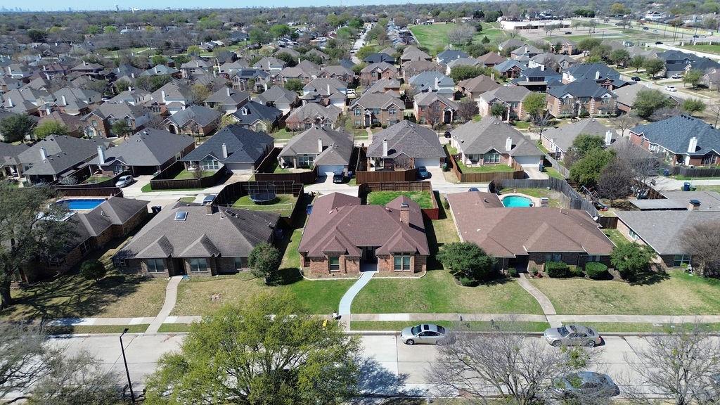 2229 Country Valley Road Garland, TX 75041 - Photo 29 of 34 an aerial view of multiple houses with yard