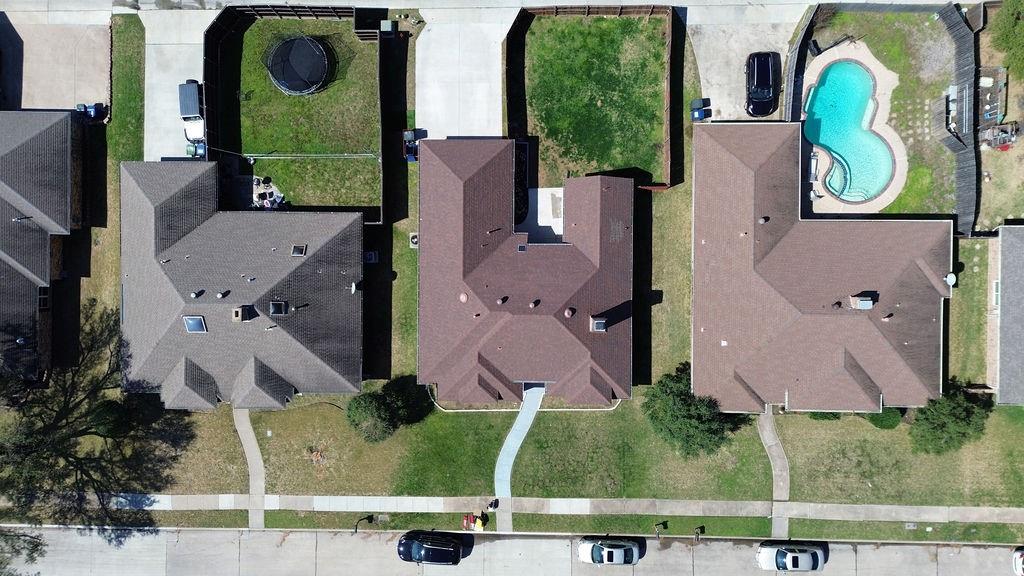 2229 Country Valley Road Garland, TX 75041 - Photo 30 of 34 an aerial view of houses with a yard