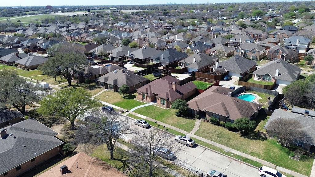 2229 Country Valley Road Garland, TX 75041 - Photo 31 of 34 an aerial view of multiple houses with yard