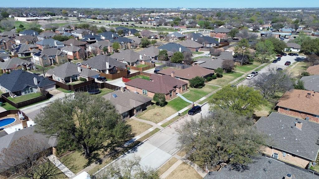 2229 Country Valley Road Garland, TX 75041 - Photo 32 of 34 an aerial view of a city with lots of residential buildings
