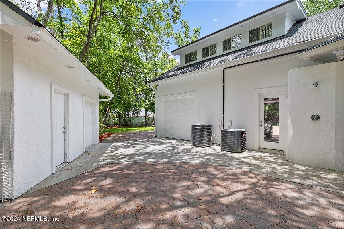 3392 Marbon Road Jacksonville, FL 32223 - Photo 40 of 53 40-Garage and Outdoor Shower