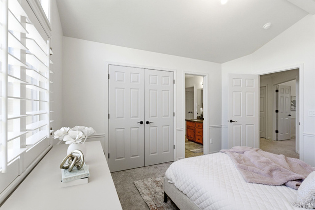 1712 Somerset Ridge Drive Draper, UT 84020 - Photo 40 of 76 Bright interior space featuring white walls and a vaulted ceiling