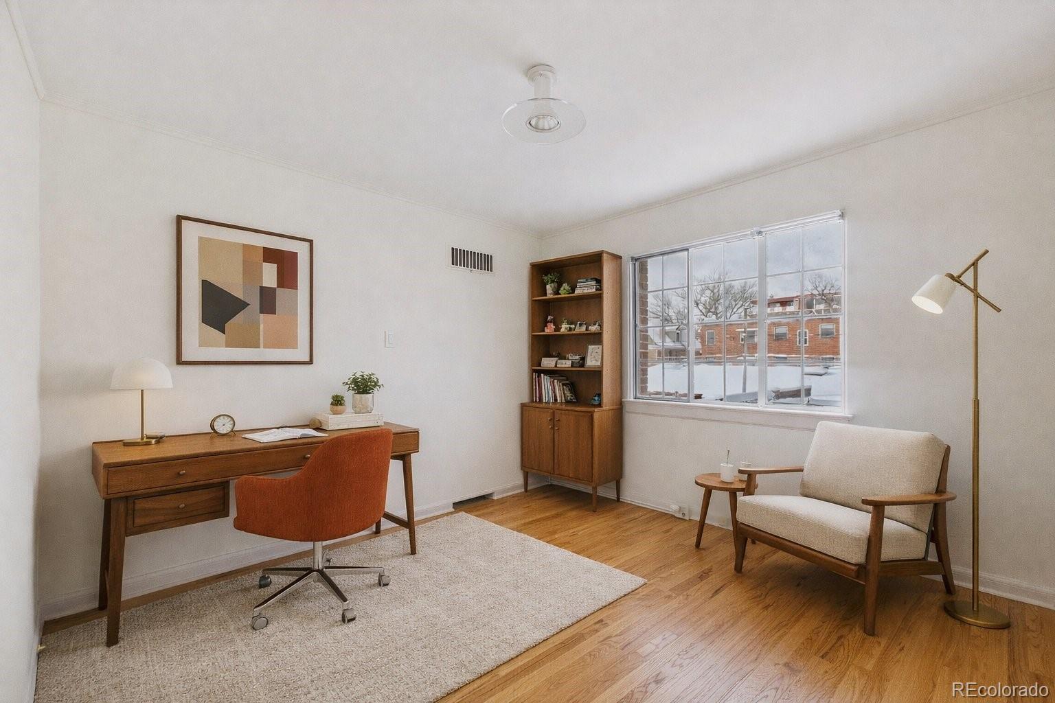 943 Emerson Street, Unit 4 Denver, CO 80218 - Photo 14 of 17 a workspace with furniture and a window