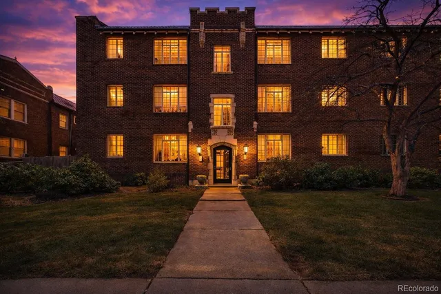 a front view of a multi story residential apartment building