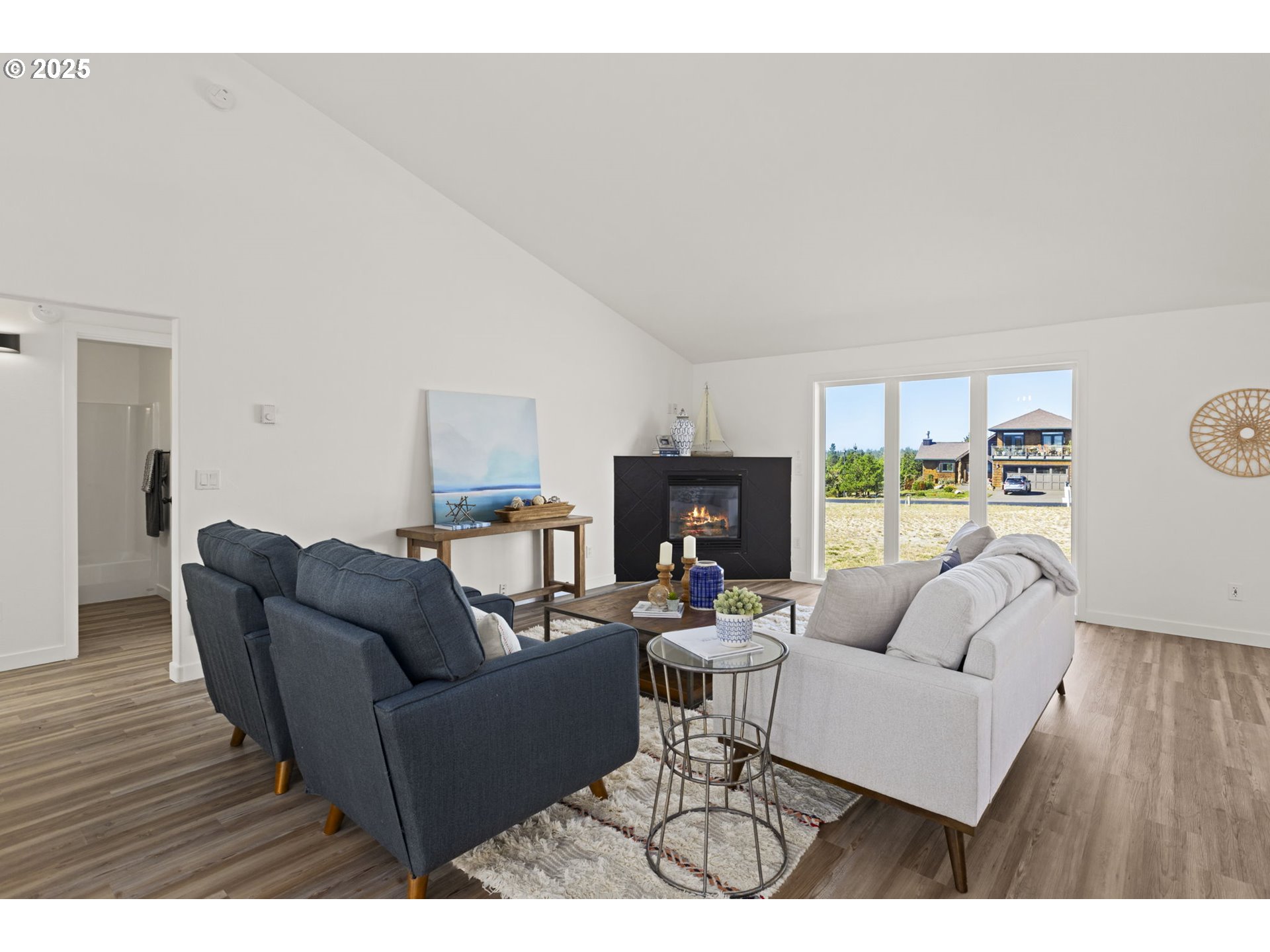 9980 Pine Ridge Drive Nehalem, OR 97131 - Photo 6 of 27 a living room with furniture and a wooden floor