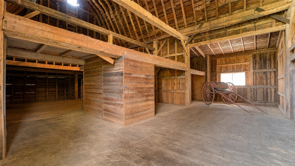 150 William Kidder Road Lancaster, NY 14086 - Photo 32 of 39 The interior of the Bank Barn, displaying the mass
