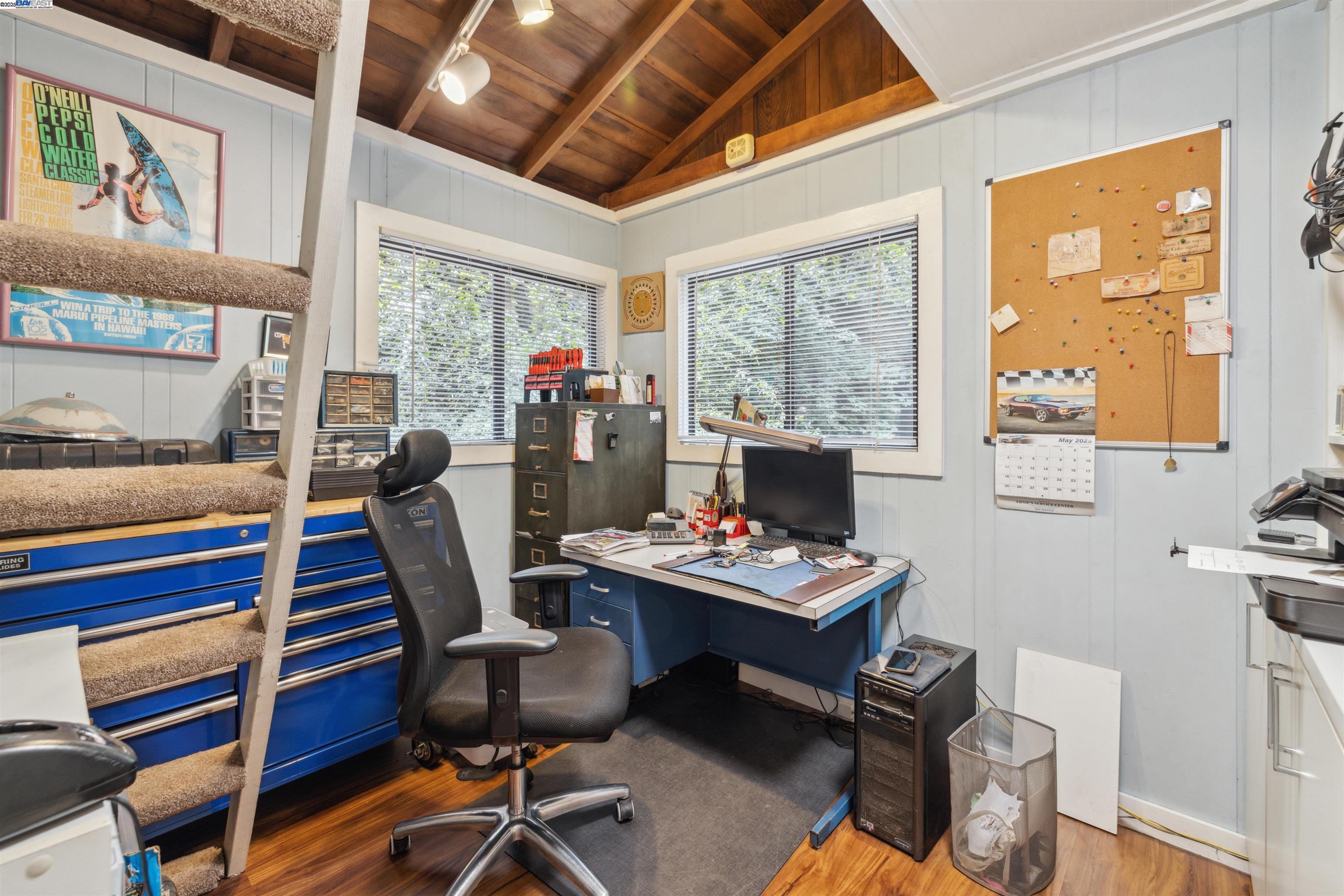 495 Primavera Road Boulder Creek, CA 95006 - Photo 7 of 33 a view of a workspace with furniture and a window
