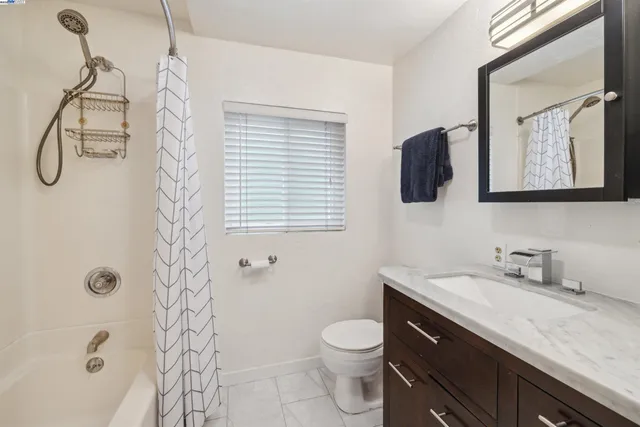 a chair and table in a balcony