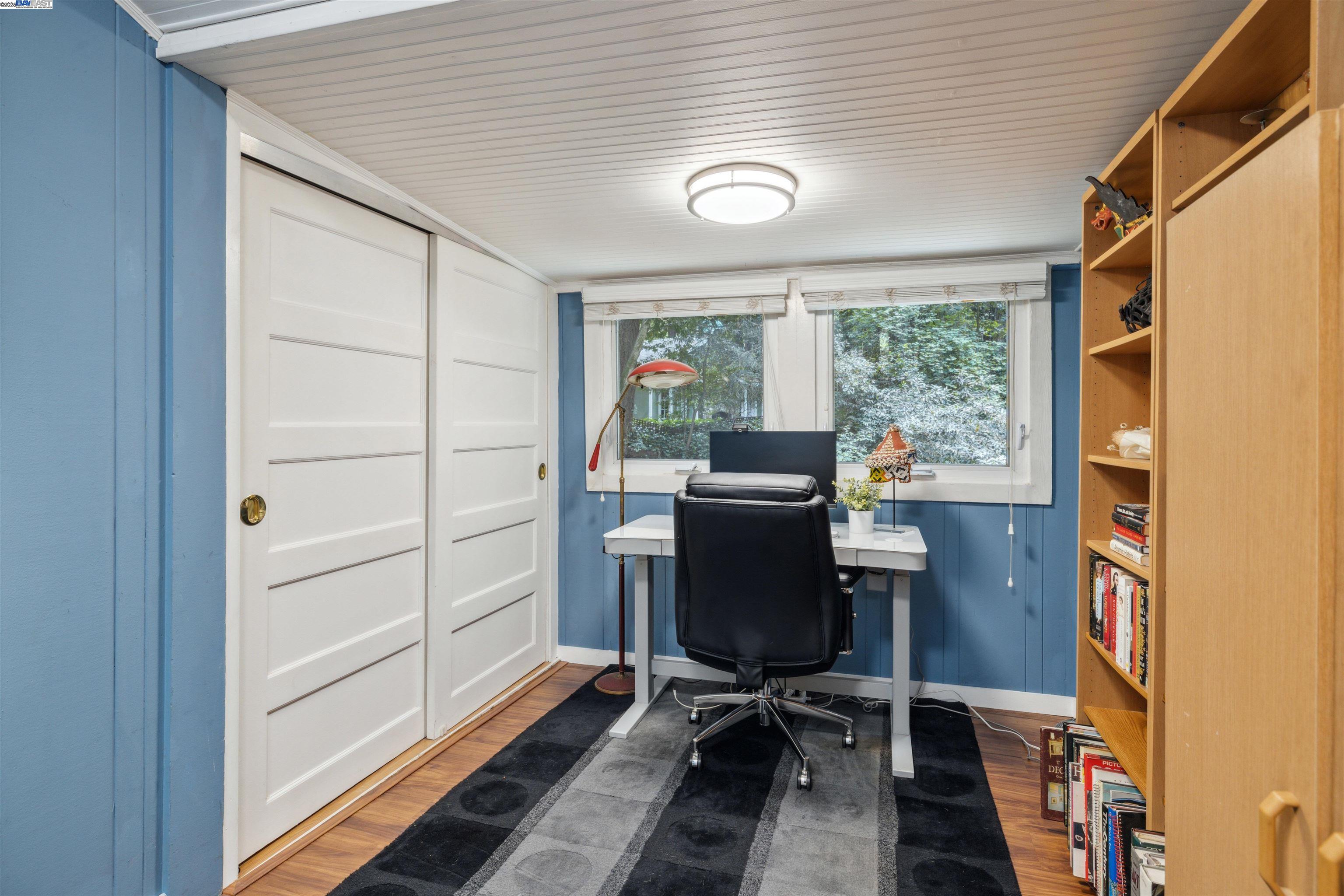 495 Primavera Road Boulder Creek, CA 95006 - Photo 10 of 33 a view of a workspace with furniture and a window