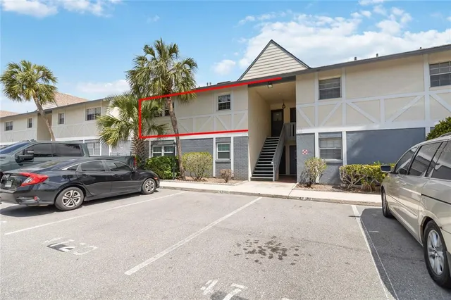 a car parked in front of a house