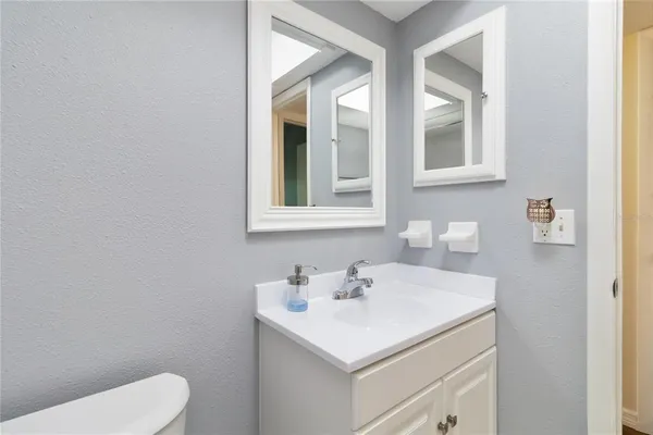 a bathroom with a sink and a toilet