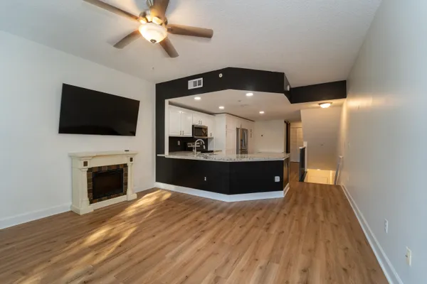 a bathroom with a toilet a sink and a mirror