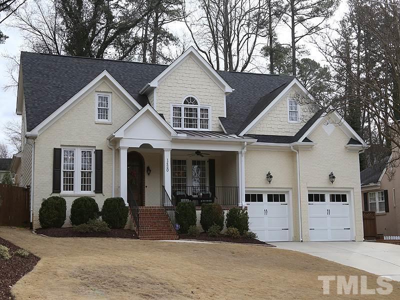 1420 Duplin Road Raleigh, NC 27607 - Photo 1 of 25 a view of a house with a yard