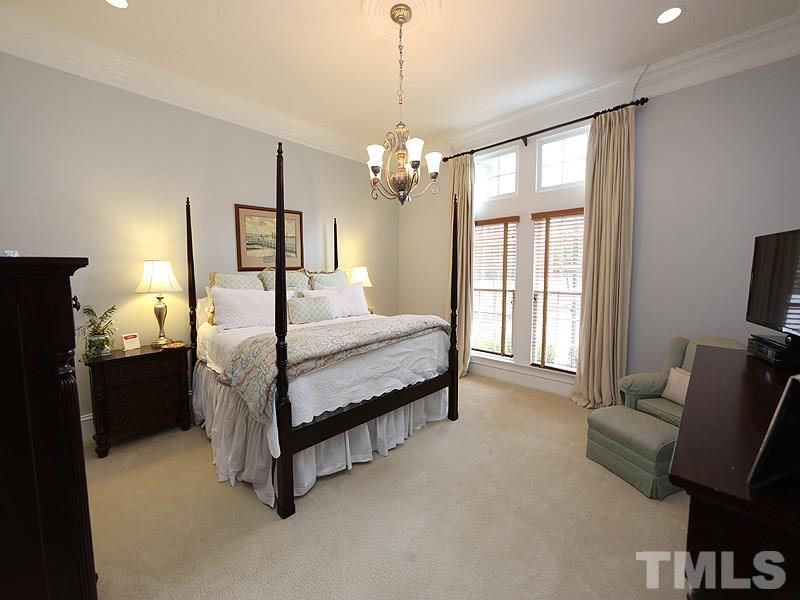 1420 Duplin Road Raleigh, NC 27607 - Photo 14 of 25 a bedroom with bed and window