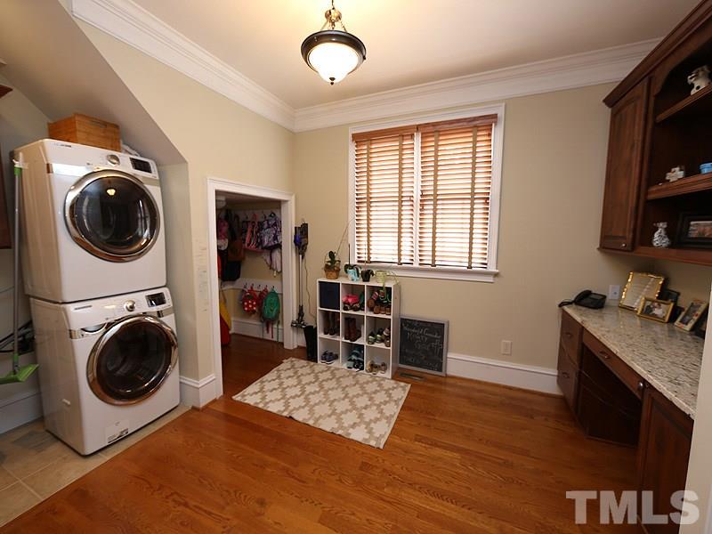 1420 Duplin Road Raleigh, NC 27607 - Photo 17 of 25 a room with a washer and dryer next to a window