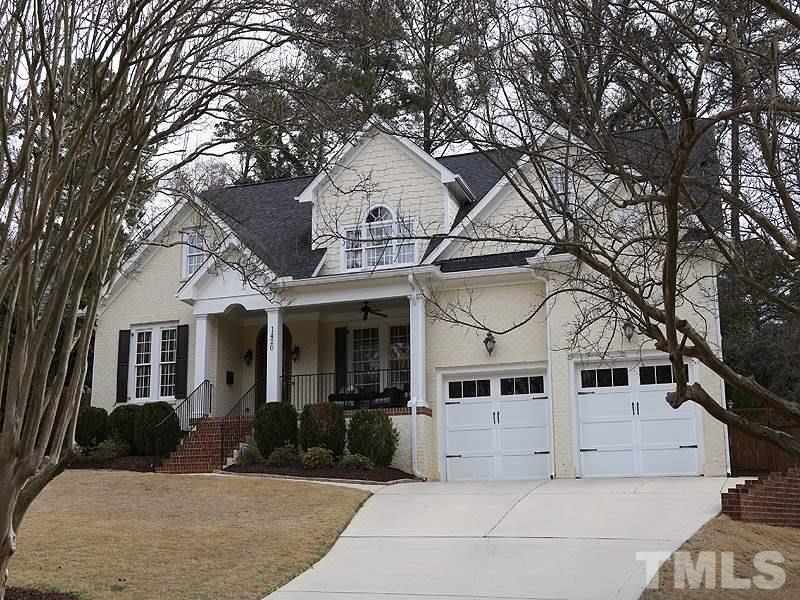 1420 Duplin Road Raleigh, NC 27607 - Photo 3 of 25 a front view of a house with a yard