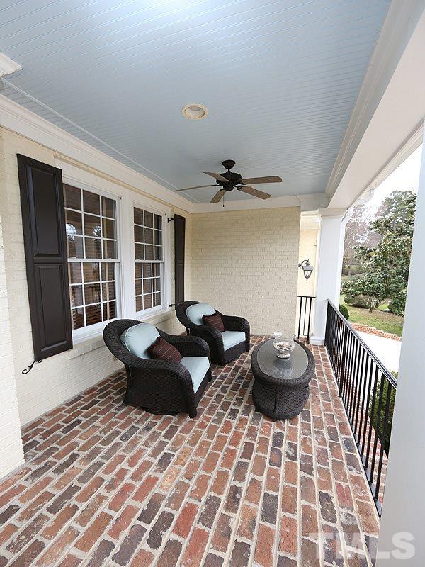 1420 Duplin Road Raleigh, NC 27607 - Photo 4 of 25 a living room with a couch and a large window