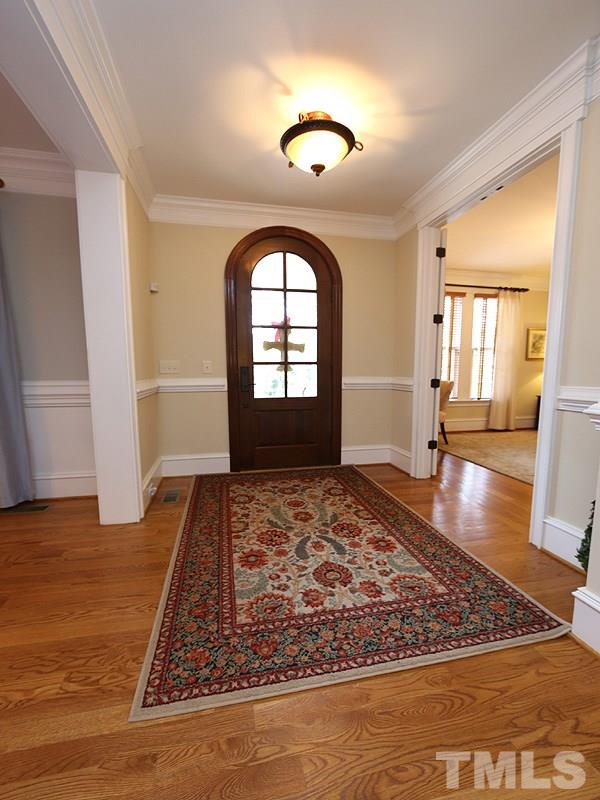 1420 Duplin Road Raleigh, NC 27607 - Photo 6 of 25 a living room with a rug