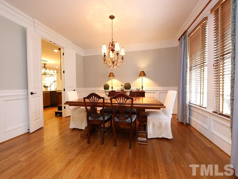 1420 Duplin Road Raleigh, NC 27607 - Photo 7 of 25 a view of a dining room with furniture window and wooden floor
