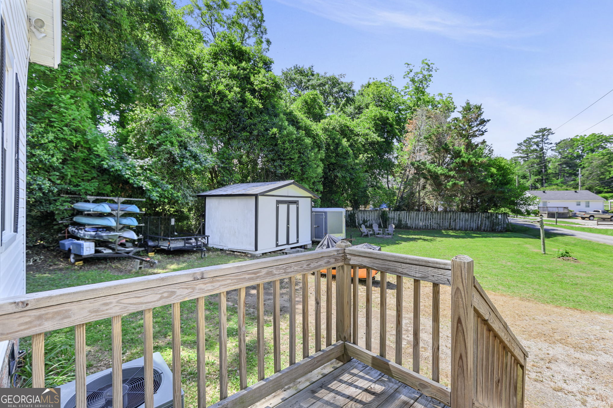1205 Terrell Street Greenville, GA 30222 - Photo 46 of 50 a view of a wooden deck and a yard