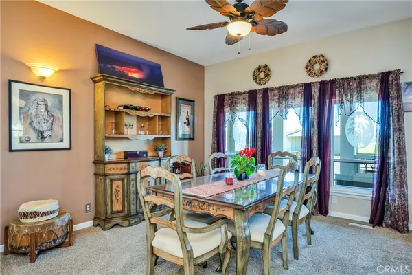 a view of kitchen with furniture and window