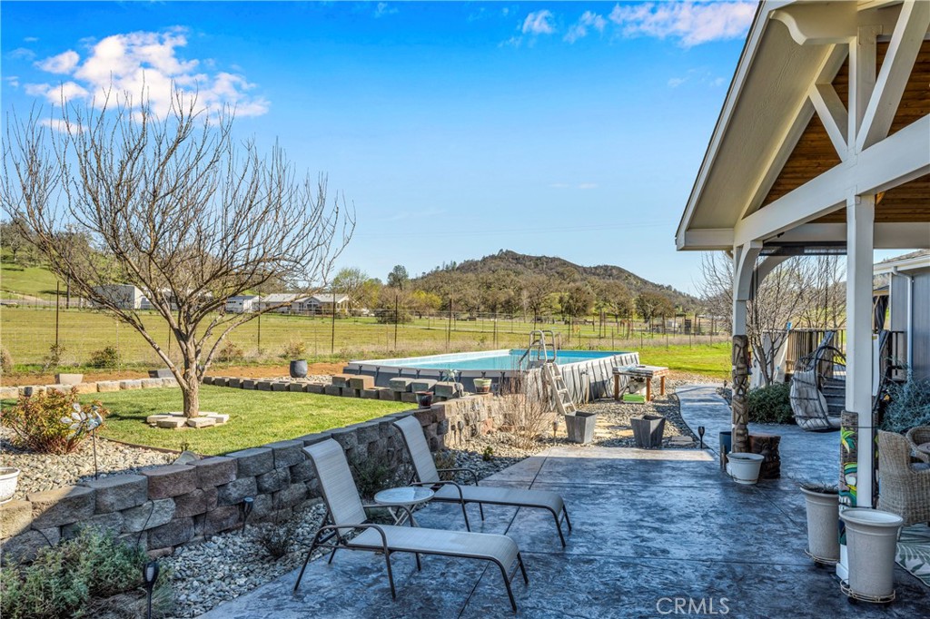 17432 Sendero Way Lower Lake, CA 95457 - Photo 44 of 65 a view of swimming pool with outdoor seating and plants