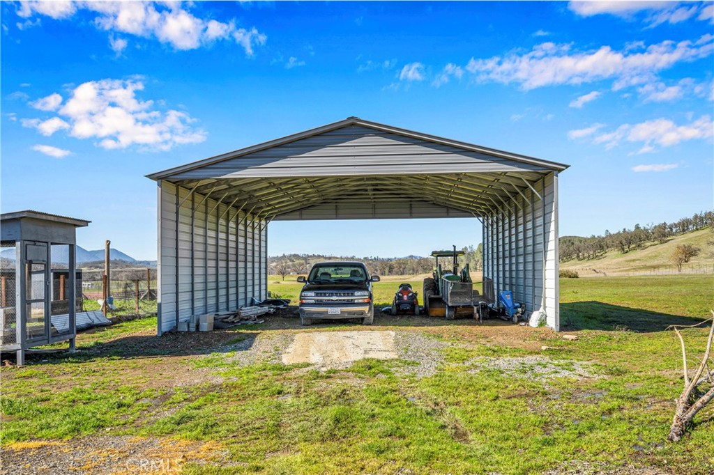 17432 Sendero Way Lower Lake, CA 95457 - Photo 51 of 65 a view of a house with a swimming pool