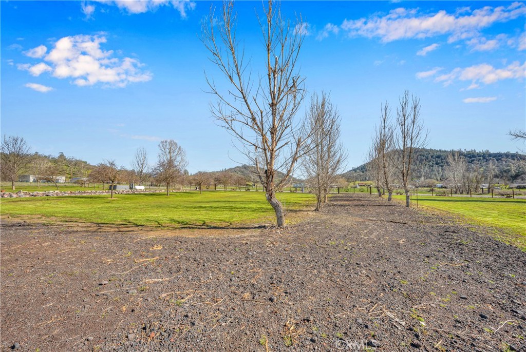 17432 Sendero Way Lower Lake, CA 95457 - Photo 56 of 65 a view of a house with a swimming pool