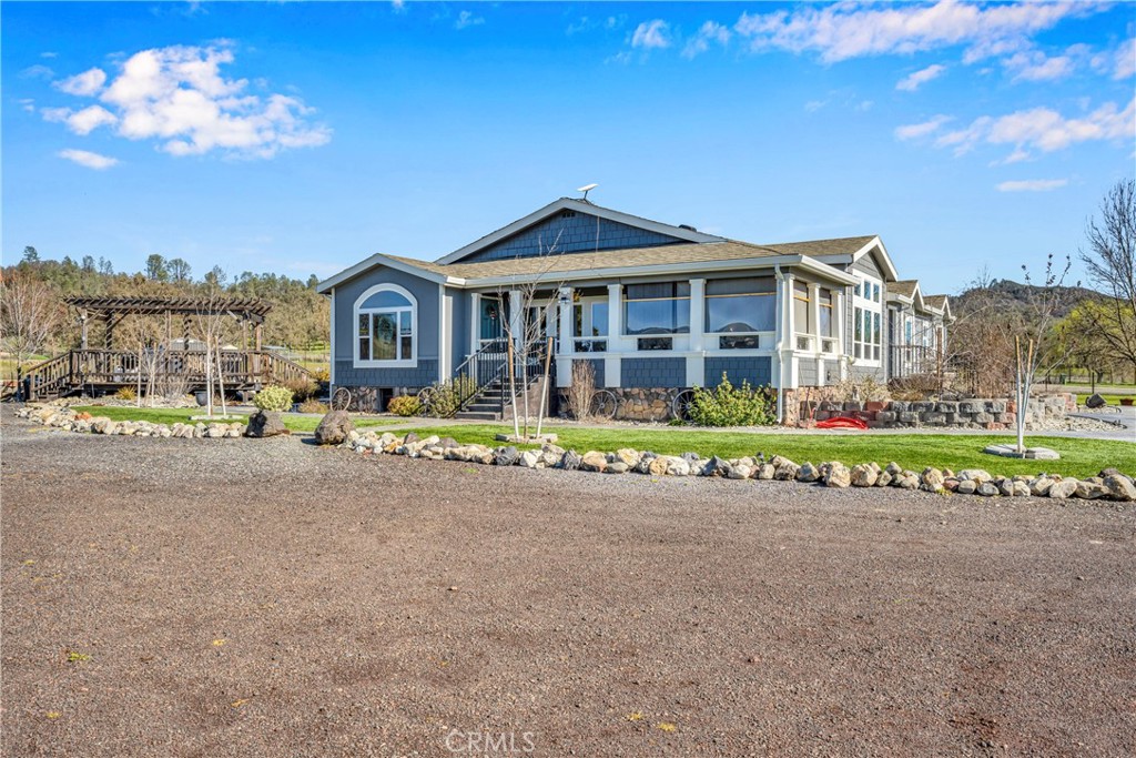 17432 Sendero Way Lower Lake, CA 95457 - Photo 57 of 65 a front view of a house with a garden