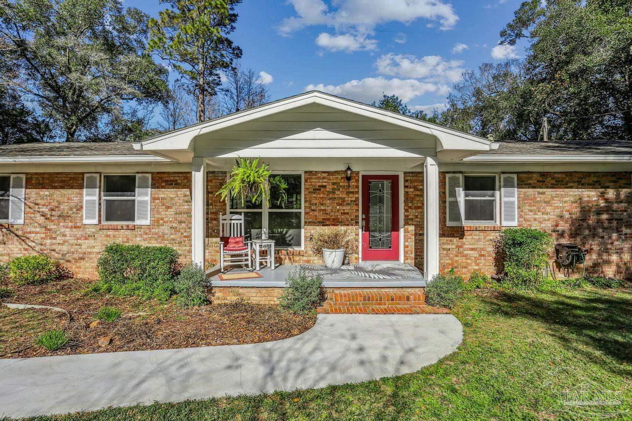 4900 Shell Road Milton, FL 32583 - Photo 3 of 52 front view of house with a yard