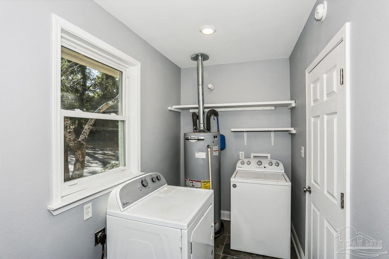 4900 Shell Road Milton, FL 32583 - Photo 33 of 52 a room with storage and utility