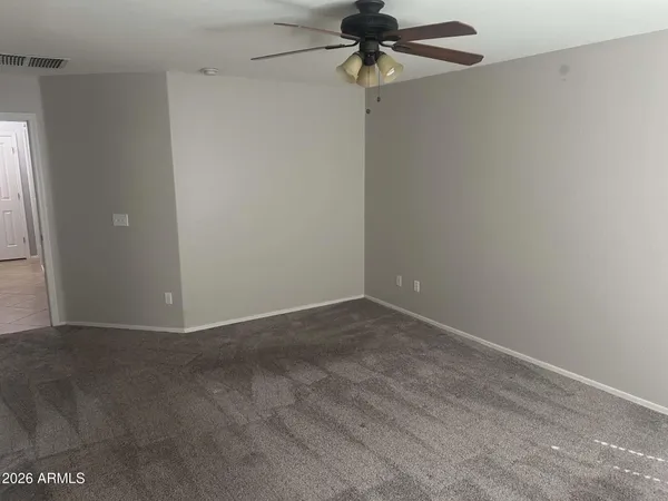 a view of a small space with a fan