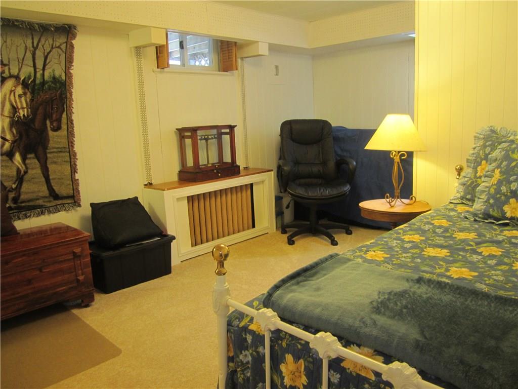 203 Murrysville Road Level Green, PA 15085 - Photo 17 of 24 Office, den, 4th bedroom...you name it. Room has closet and window. This area would make a great guest or in-law space. Bath, bedroom, kitchen and gameroom are all here.