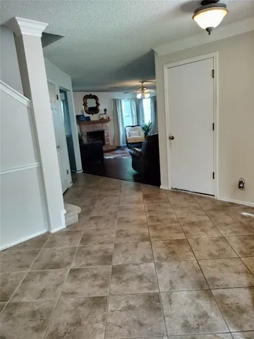 a view of a kitchen with furniture and a kitchen
