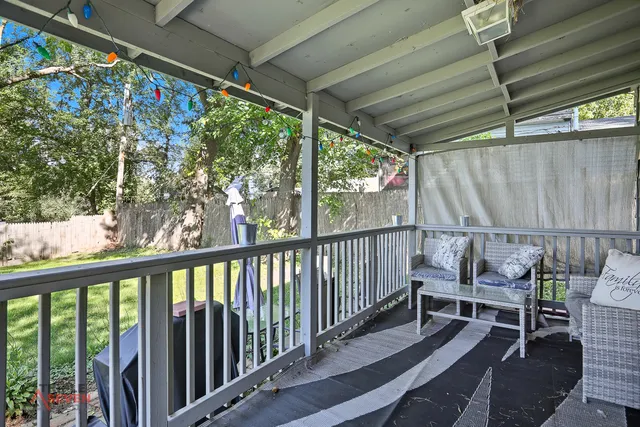a view of a garden with a lake view