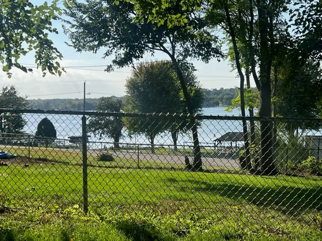 a backyard of a house with lots of green space