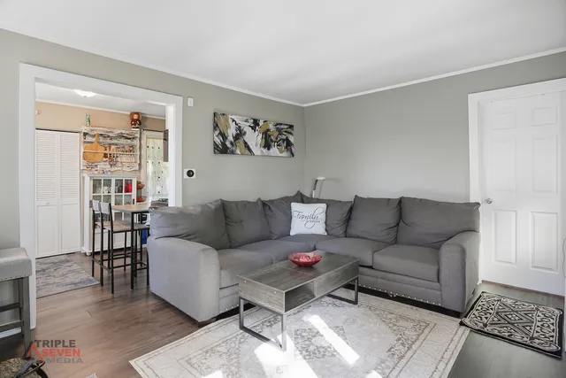 a living room with furniture and a couch