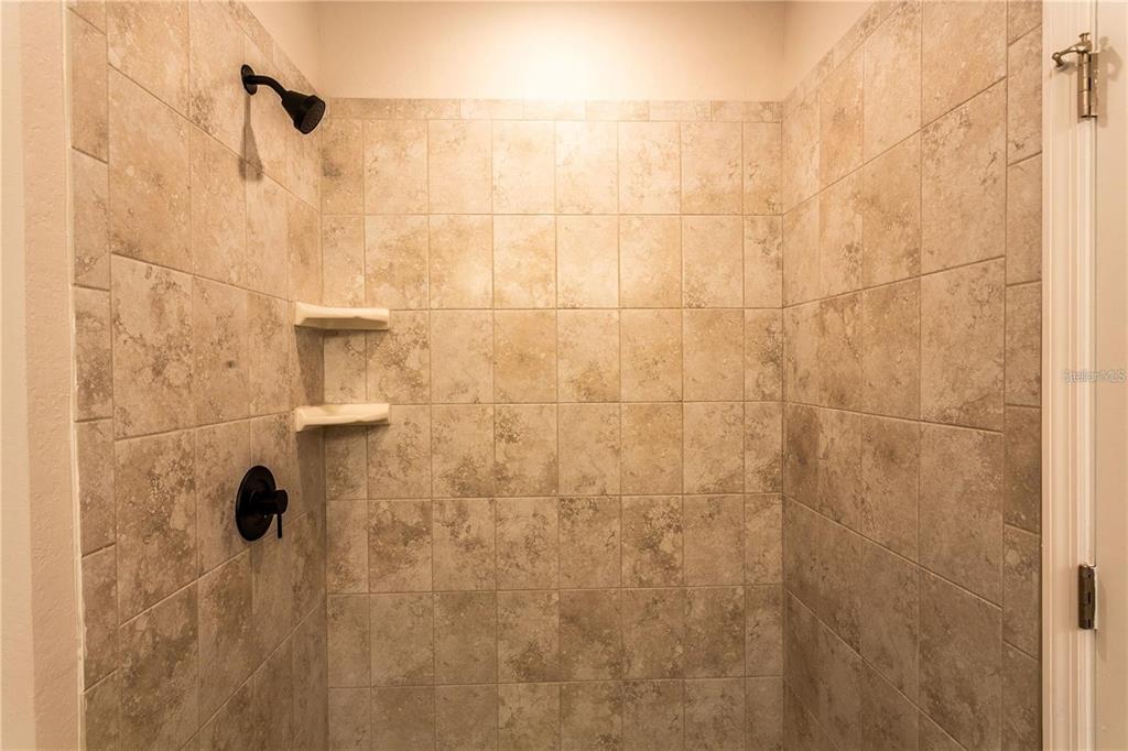 133 Angol Street Punta Gorda, FL 33983 - Photo 15 of 34 a bathroom with a shower