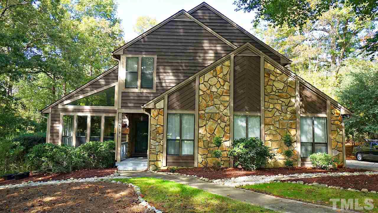 10517 Whitestone Road Raleigh, NC 27615 - Photo 1 of 30 Contemporary Home on 1.7 Private Acres. Backs to 14 acres of property owned by the HOA.