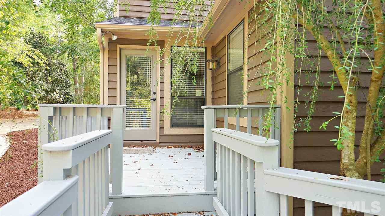 10517 Whitestone Road Raleigh, NC 27615 - Photo 28 of 30 Enjoy your morning coffee on your deck off the master bedroom.