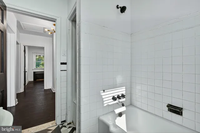 a bathroom with a bathtub