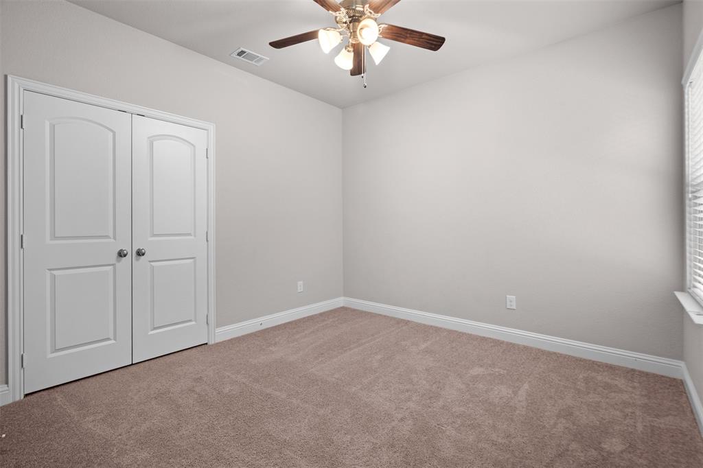 119 Happy Lane Red Oak, TX 75154 - Photo 27 of 37 Neutral tone wall paint with matching baseboards